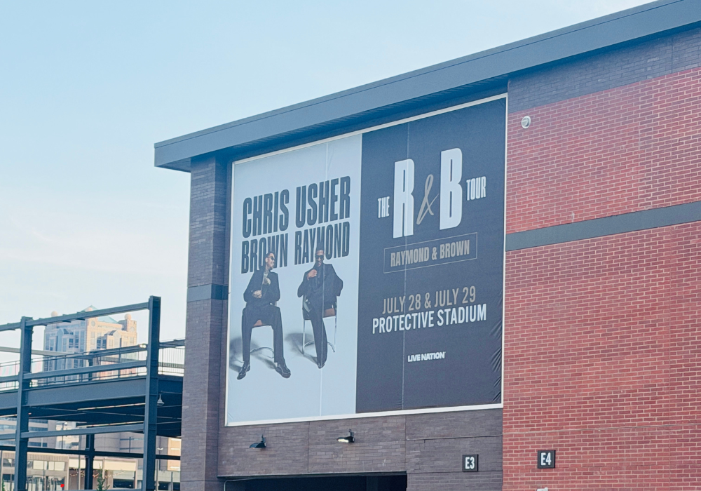 Chris Brown and Usher R&B Tour banner outside Protective Stadium, July 28 and 29 concert dates.